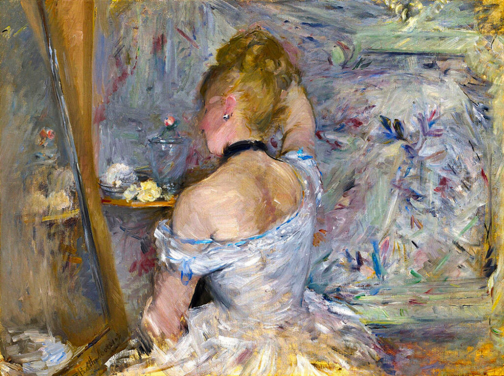 Woman at the mirror, by Berthe Morisot