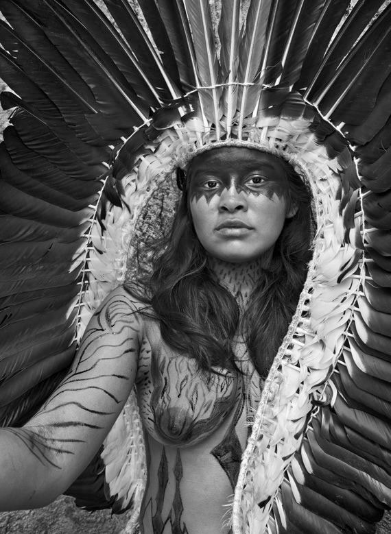 Sebastiao Salgado & Awa woman with feathers @ Amazonas